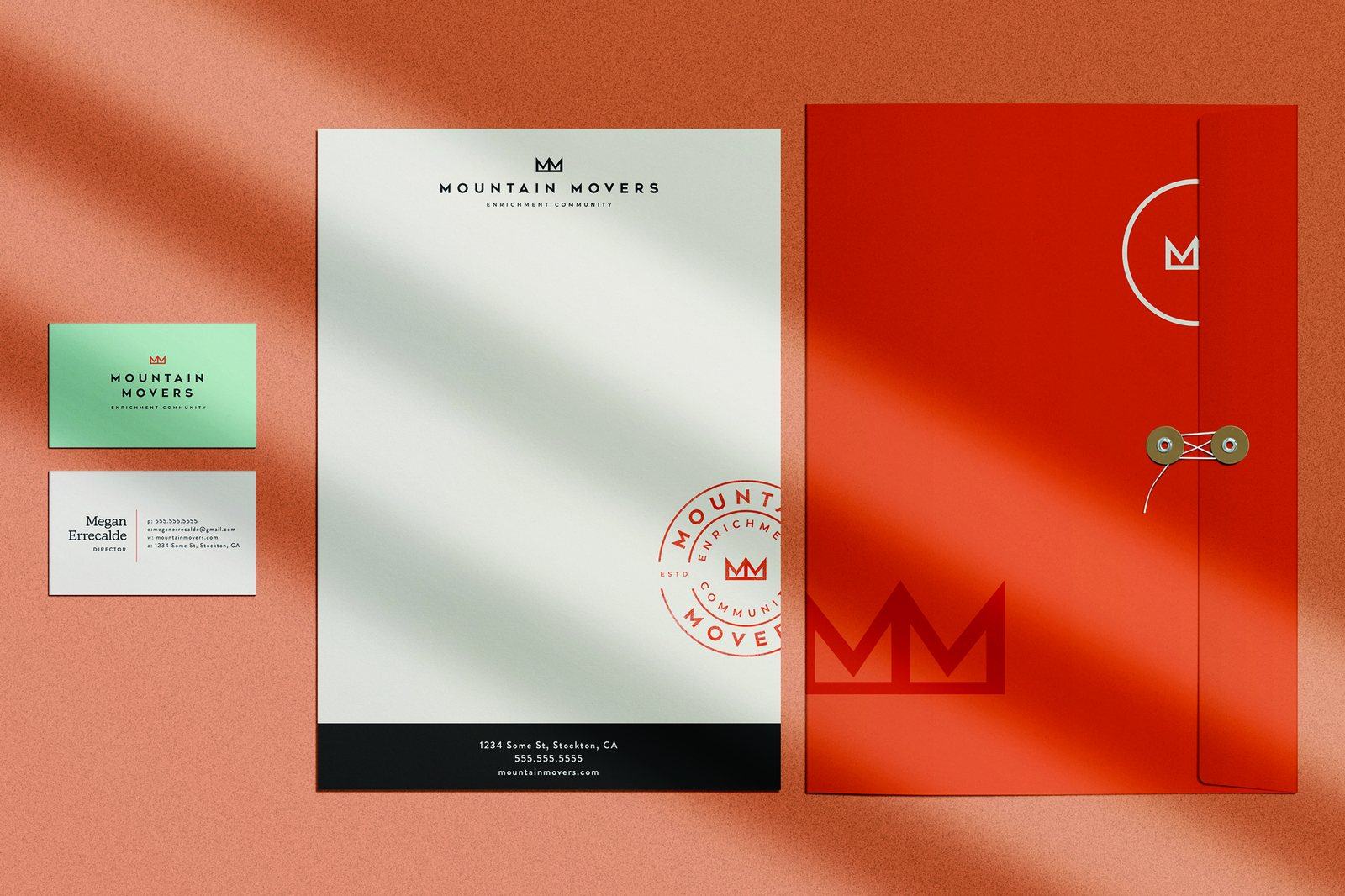 Mountain Movers stationery on orange