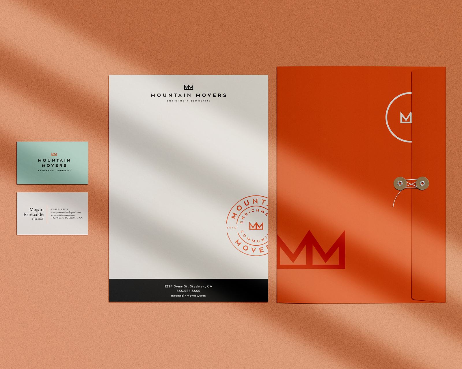 Mountain Movers stationery on orange
